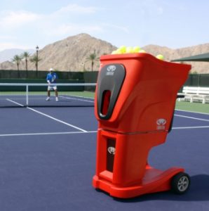Man-using-tennis-ball-machine
